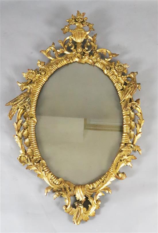 A George III carved giltwood wall mirror, W.2ft 5in. H.4ft